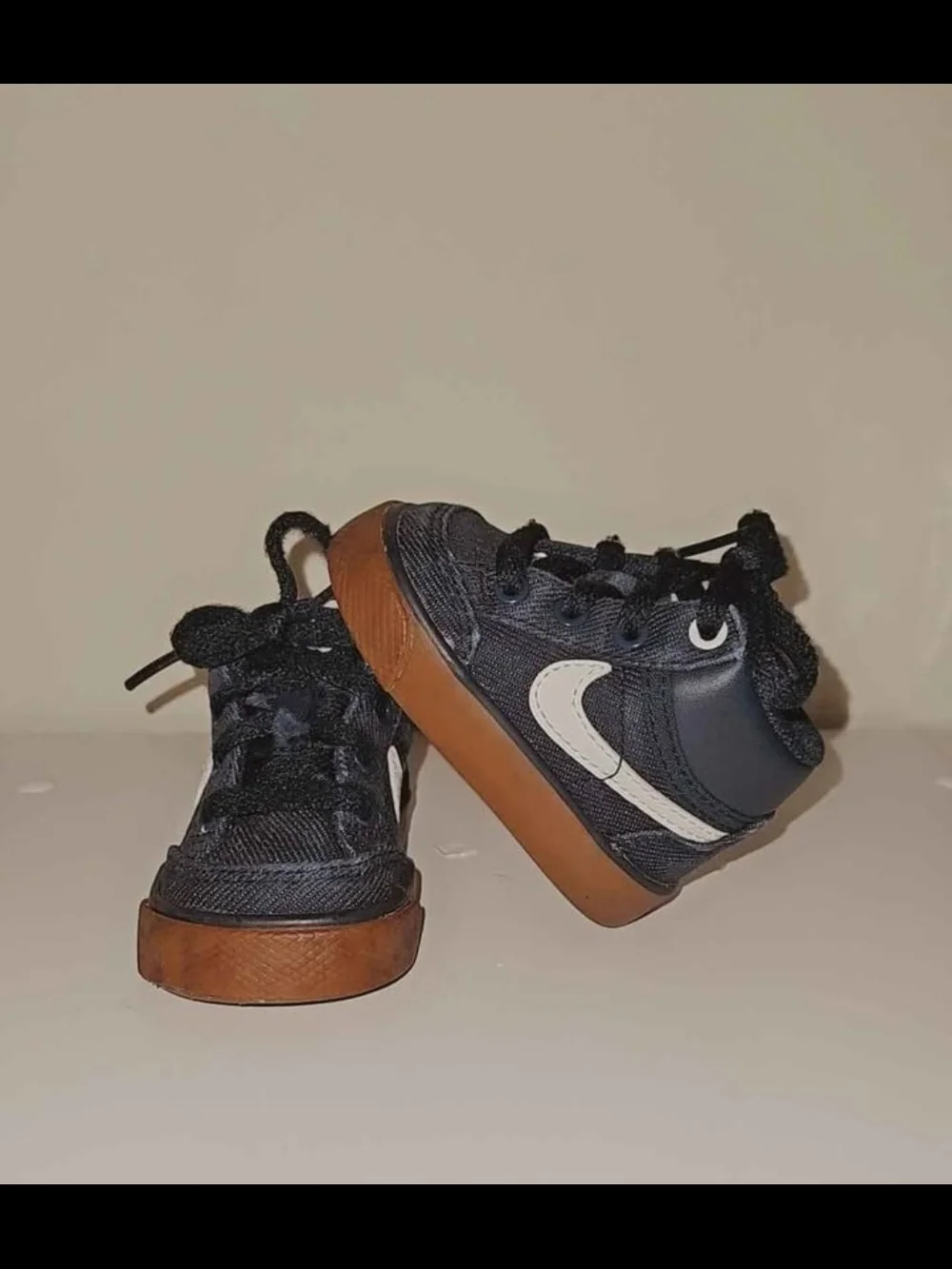Nike Black High-Top Baby Sneakers with White Swoosh and Gum Sole